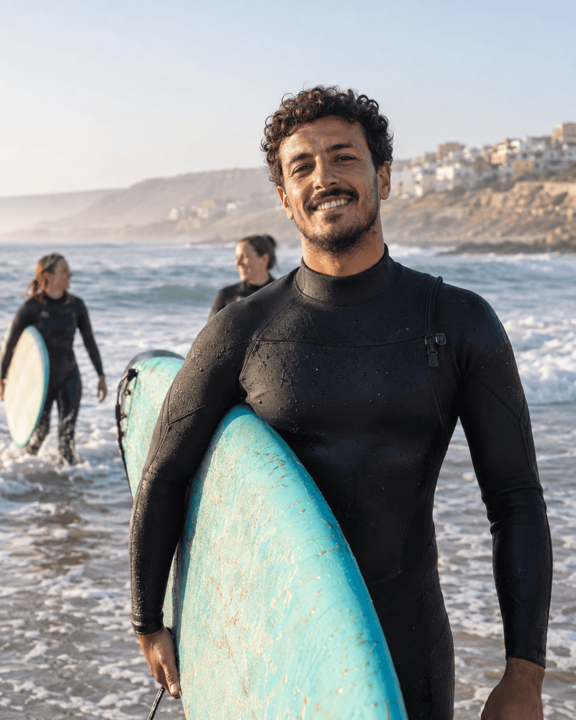 Mohamed, Vibeline surf coach, at the beach in Tamraght